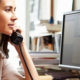 woman using VoIP phone